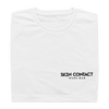 Folded white t-shirt with Skin Contact Wine Bar logo on the front